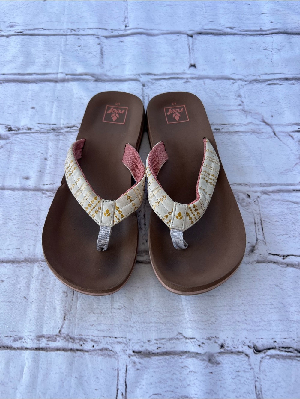 Reef Brown Flip-Flops with Cream Straps and Pink Lining